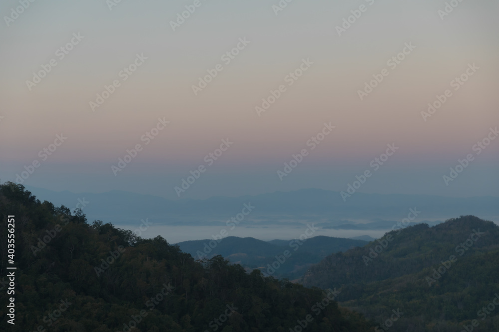 Fototapeta premium Mountain view morning of the hills around Landscape of Doi Samer Dao in Sri Nan National Park , Nan Province of Thailand