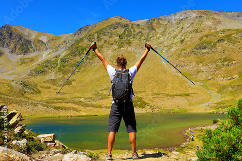 backpaker man hiker in Pyrenes photo