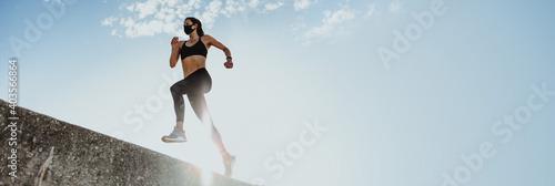 Woman doing running workout in morning
