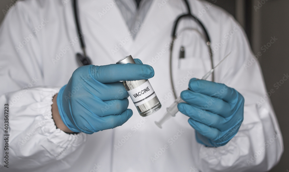 A doctor showing you to get the vaccine. A doctor showing you to get the vaccine.