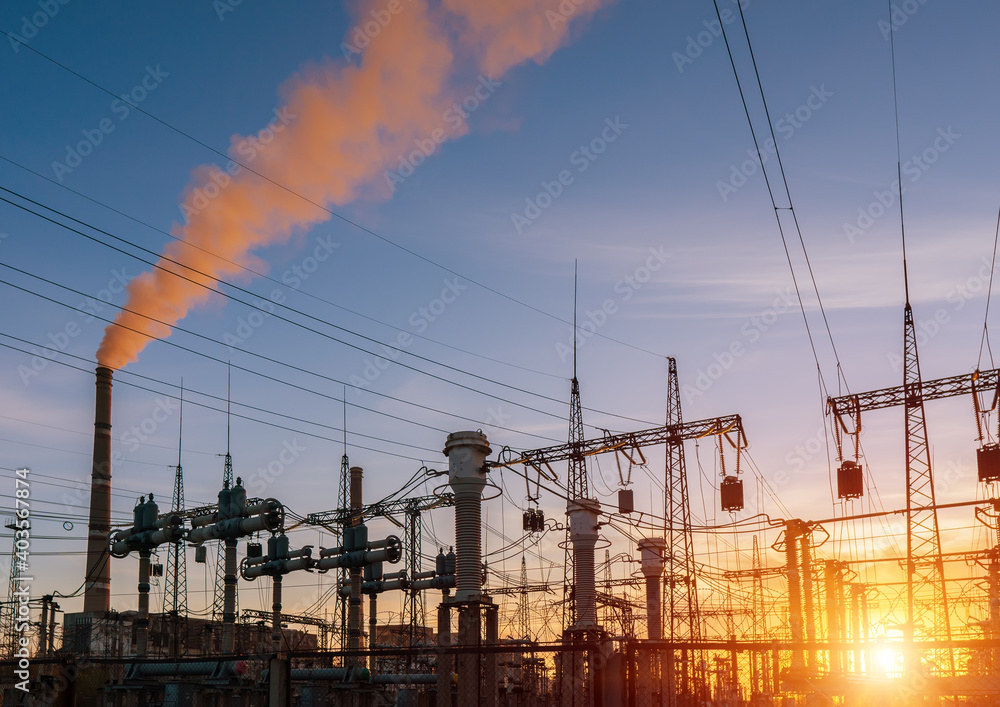 Thermal power stations and power lines during sunset. Thermal power stations and power lines during sunset.
