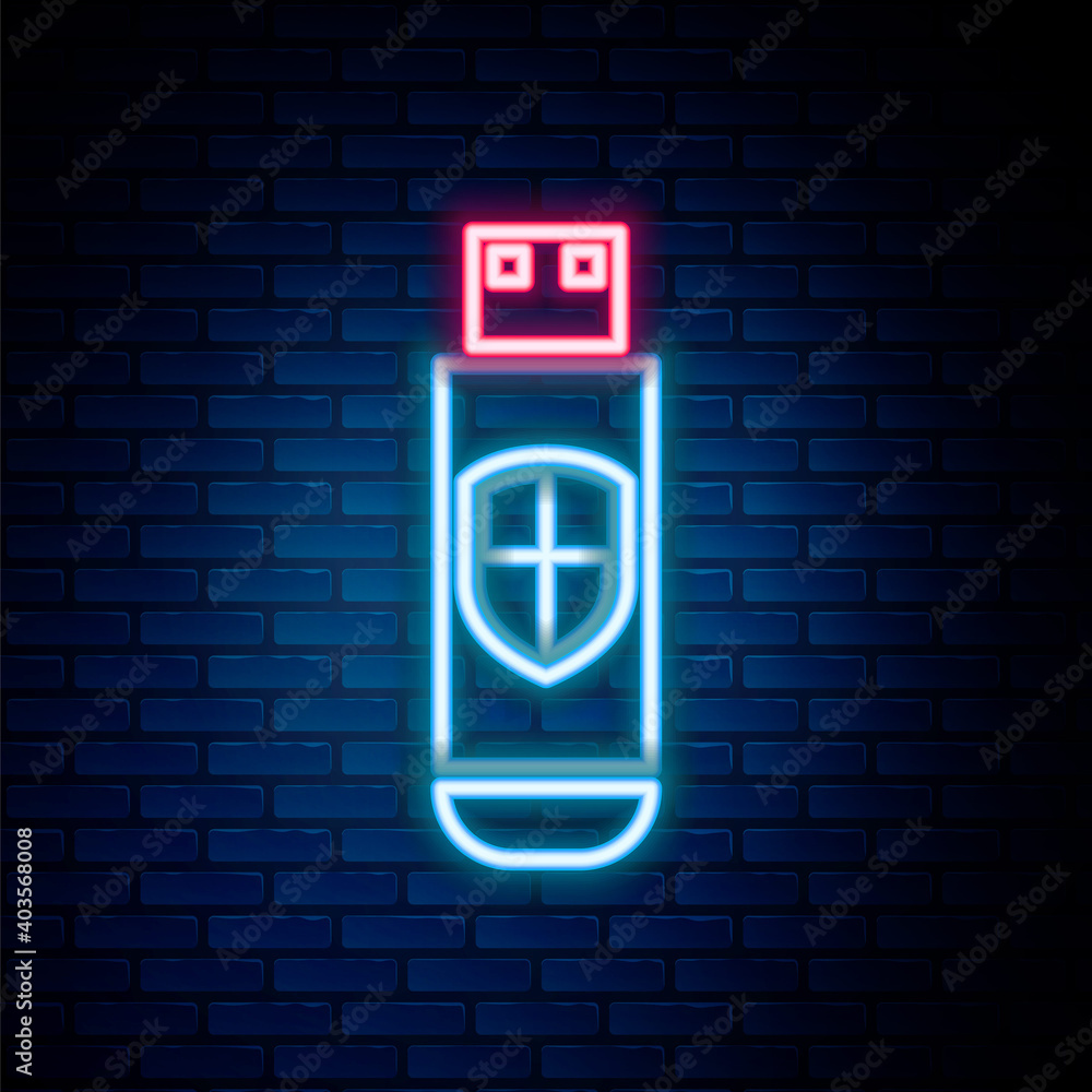 Obraz premium Glowing neon line USB flash drive and protection shield icon isolated on brick wall background. Colorful outline concept. Vector.