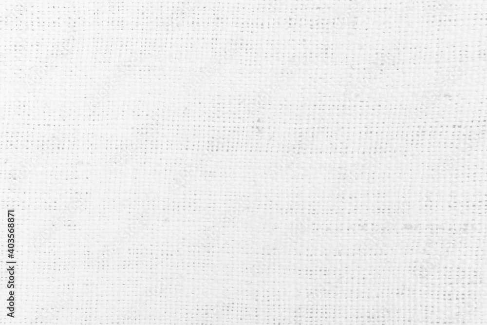 White Hemp rope texture background. Haircloth or blanket wale cloth wallpaper. Rustic sackcloth canvas fabric texture in natural. Natural vintage linen burlap weaving, Old cotton carpet background. White Hemp rope texture background. Haircloth or blanket wale cloth wallpaper. Rustic sackcloth canvas fabric texture in natural. Natural vintage linen burlap weaving, Old cotton carpet background.