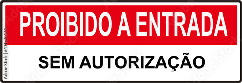 A sign that says in Portuguese Language   no entry without authorization. 