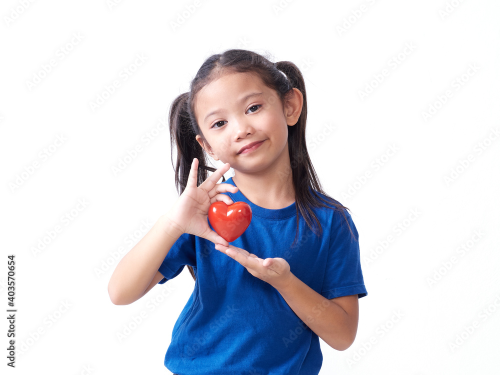 Little girl holding red heart Little girl holding red heart