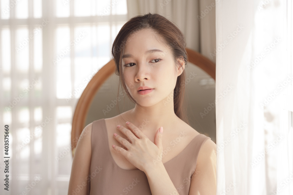 Portrait of asian beauty woman touching her chest. Portrait of asian beauty woman touching her chest.