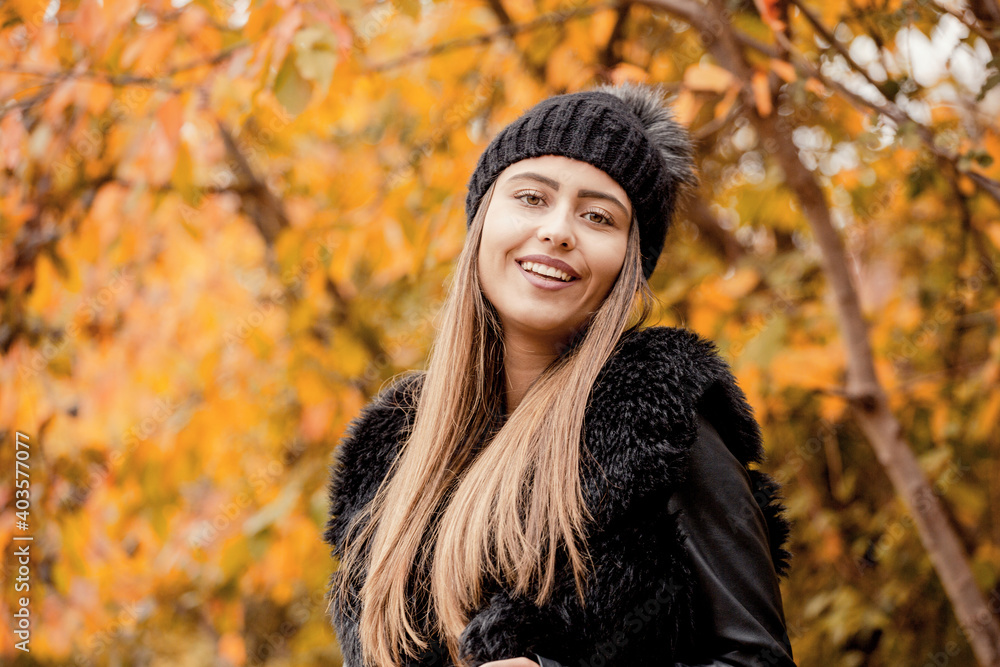 Portrait of beautiful woman in autumn park Portrait of beautiful woman in autumn park