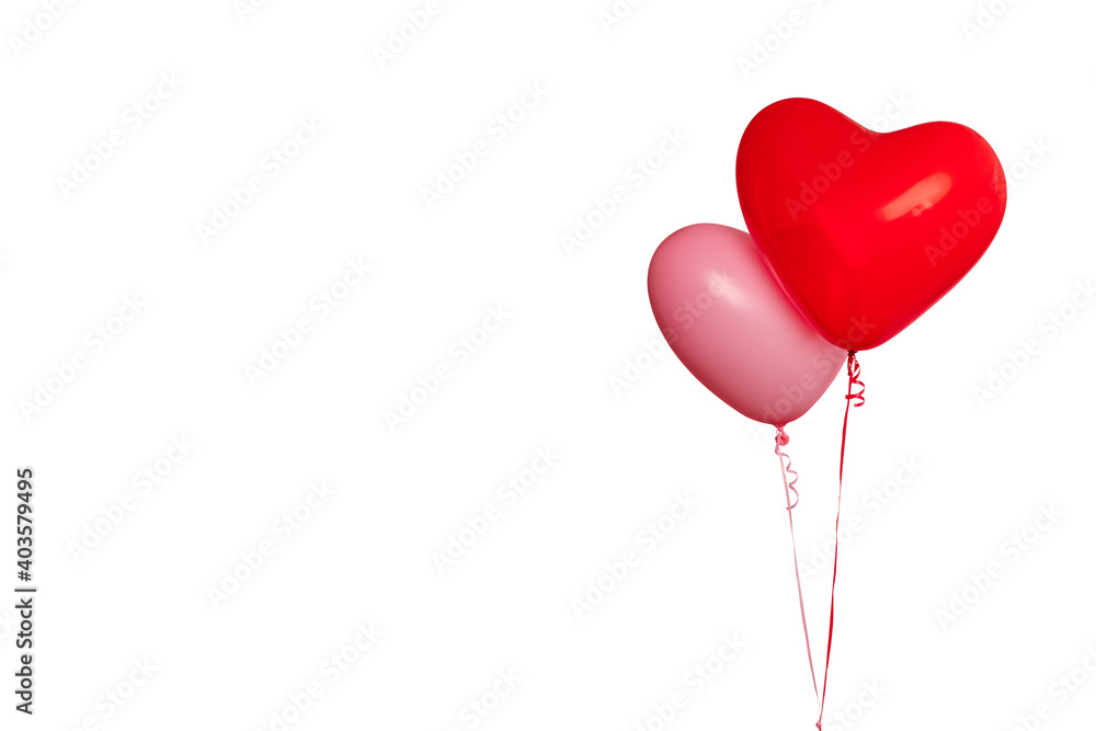 Two air rubber balloon, red and pink, symbol of love, in form of heart with helium, isolated on white background, close-up. Studio shot with copy space. Two air rubber balloon, red and pink, symbol of love, in form of heart with helium, isolated on white background, close-up. Studio shot with copy space.