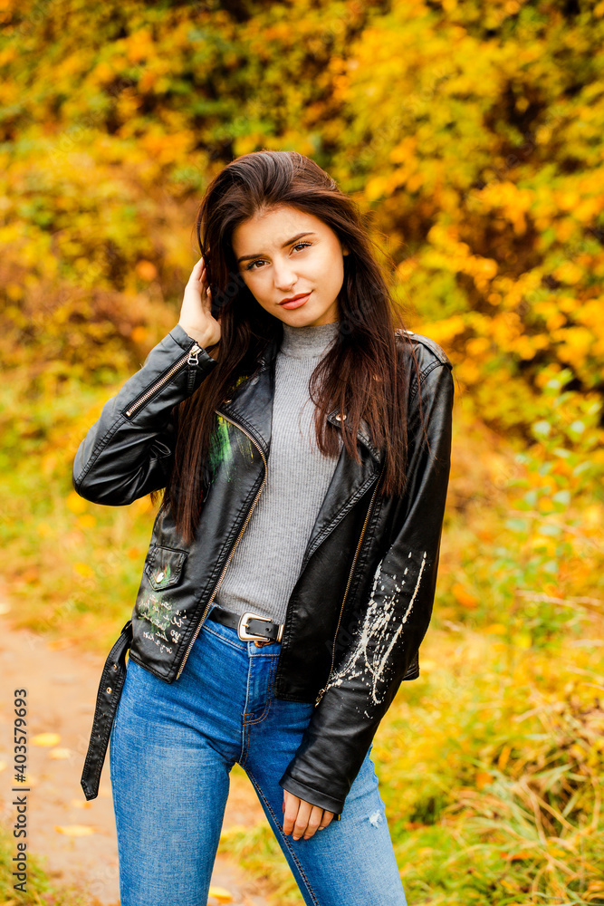 Portrait of beautiful woman in autumn park Portrait of beautiful woman in autumn park