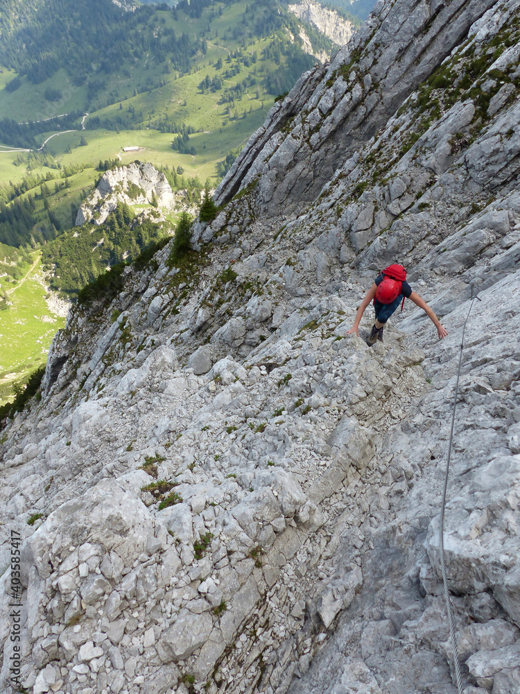 Climber at Scheffauer mountain via ferrata, Tyrol, Austria