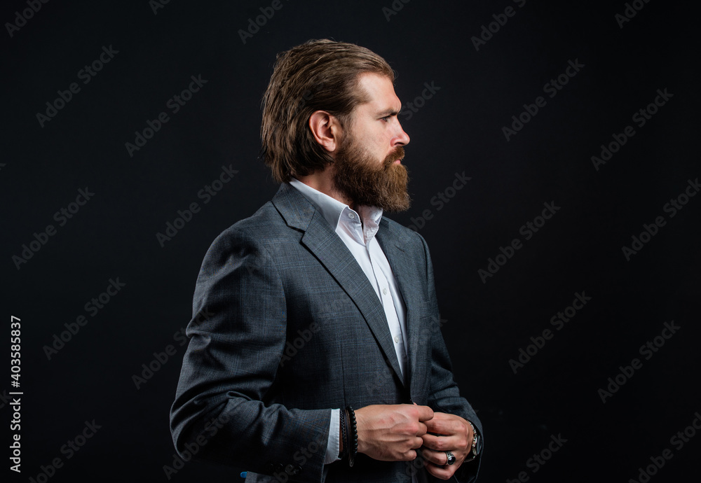 Man with beard wear grey suit corporate style, modern hipster concept Man with beard wear grey suit corporate style, modern hipster concept