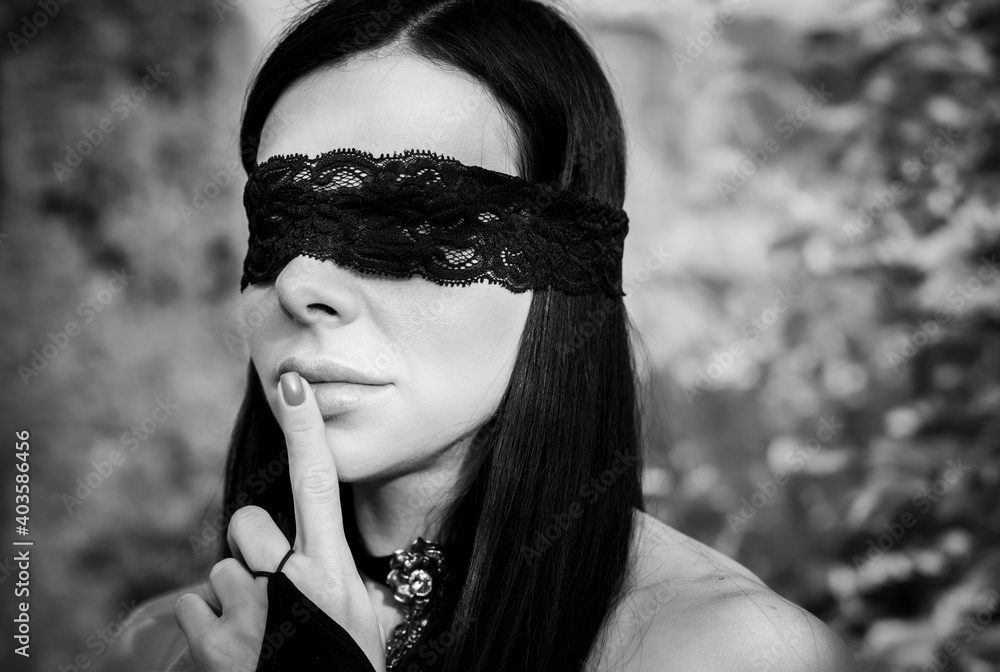 Serious Woman Adjusts Blindfold Over Her Eyes Stock Photo, Picture and  Royalty Free Image. Image 70769576.