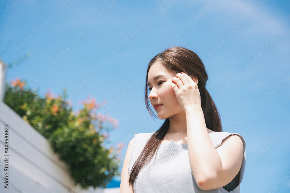 Young asian beauty woman in sunlight outdoors. Young asian beauty woman in sunlight outdoors.