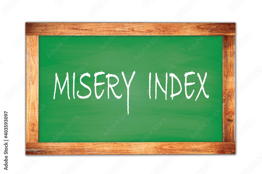 MISERY INDEX text written on green school board. MISERY INDEX text written on green school board.
