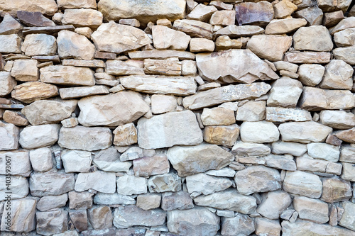 Rock wall of different sizes texture background
