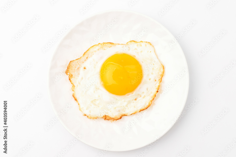 Fried eggs on white background Fried eggs on white background