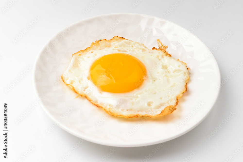 Fried eggs on white background Fried eggs on white background