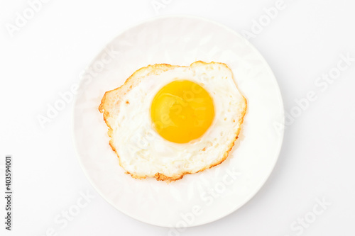 Fried eggs on white background