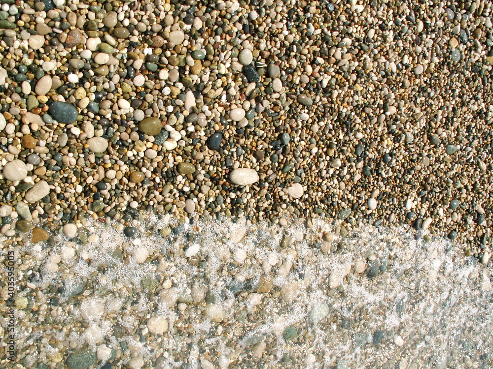 small pebbles on the shore small pebbles on the shore