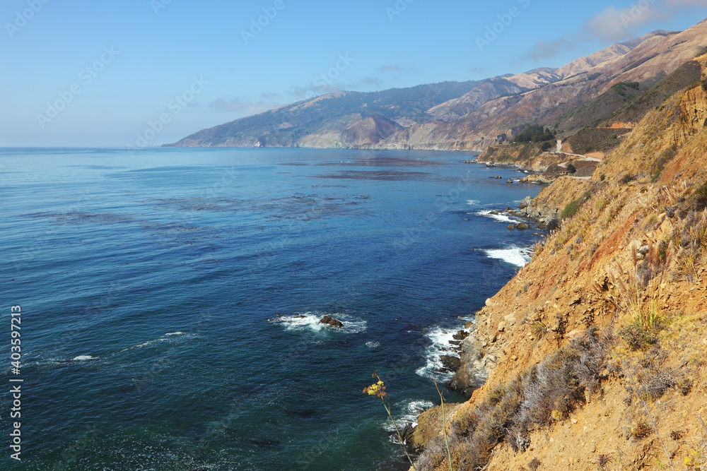 Azure surf on the steep coast Azure surf on the steep coast