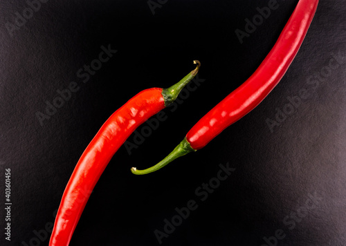Fresh hot chili pepper on dark background