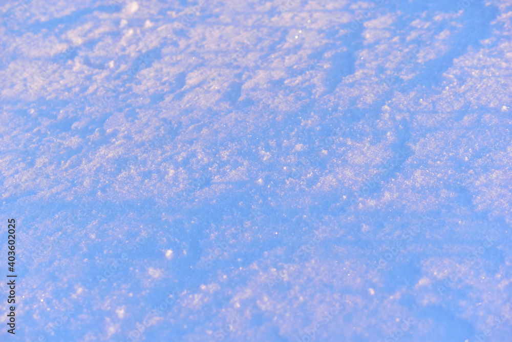 Obraz premium Sunny snow in winter on the face in the sun