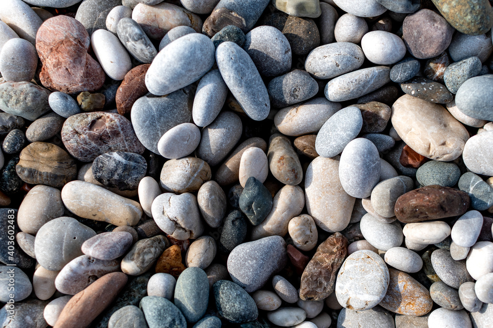 Multi-colored pebbles background. Close up. Multi-colored pebbles background. Close up.