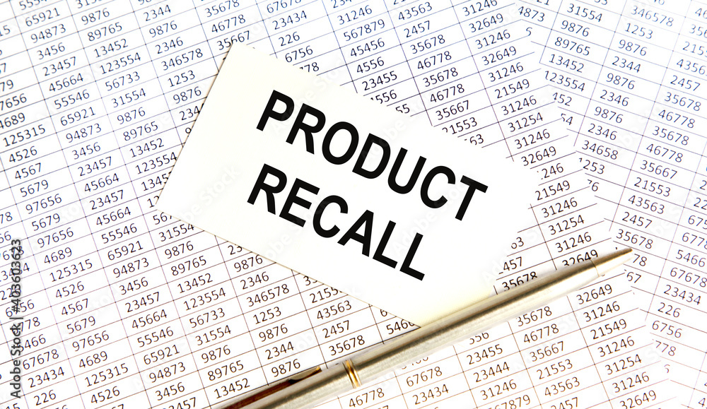 On the card text Product Recall, next to the pen, background are reports. On the card text Product Recall, next to the pen, background are reports.