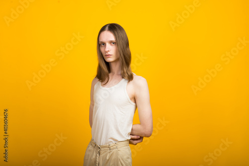 Androgynous beautiful young man. Model tests in studio.