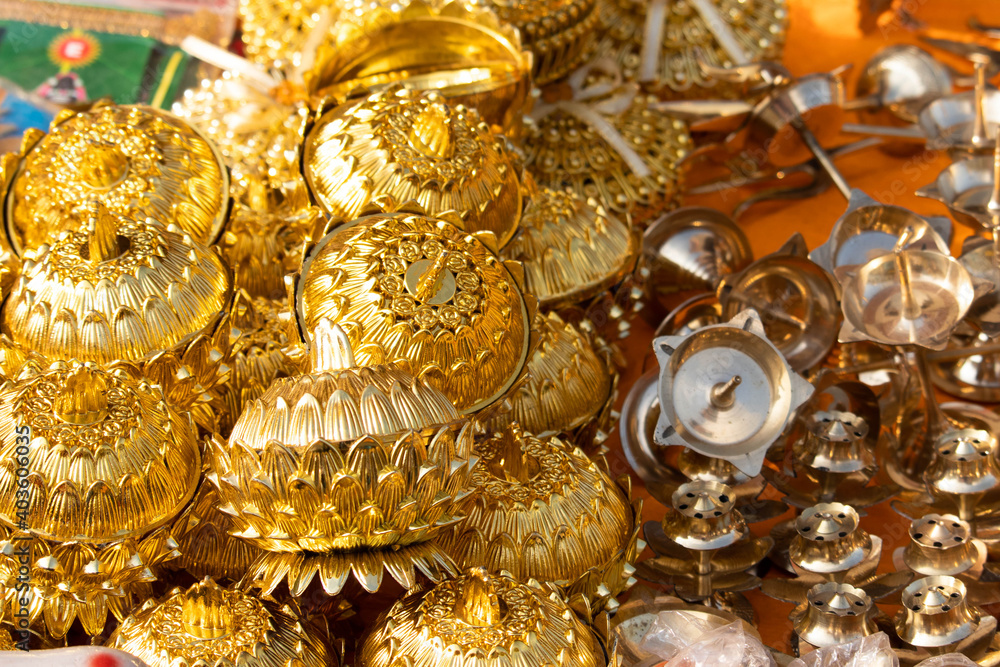 Golden Colored Floral Shaped Decorative Metal Bowls and Other Designer Vessels For Pooja Puja