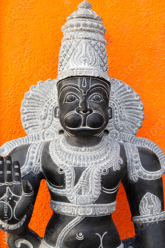 Famous Popular Handcrafted Black Stone Sculpture Statue Of Indian Hindu Lord God Idol Hanuman Bajrang Bali Made By Local Artists In Mammalapuram Tamil Nadu India photo