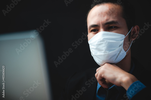 businessman in black suit w...