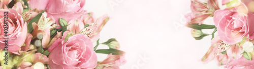 Beautiful pink rose and alstroemeria flowers in a bouquet on soft bokeh photo