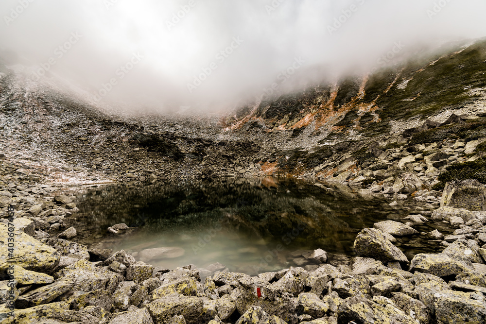 Lake landscape in the fog