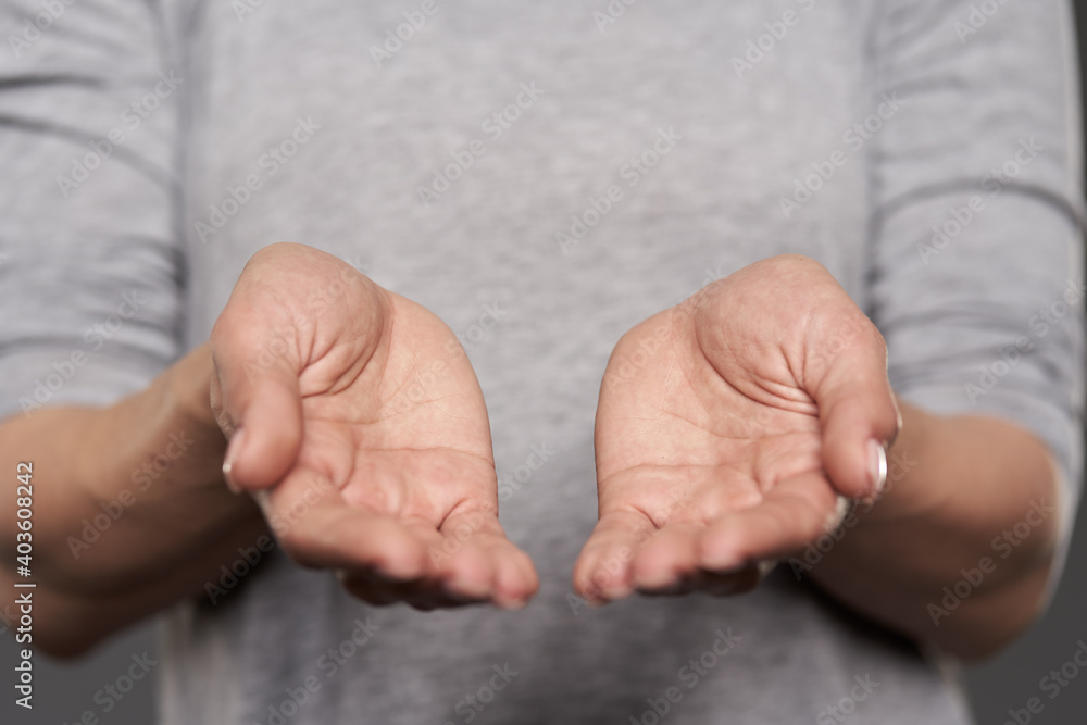 Woman's hands offering support Woman's hands offering support