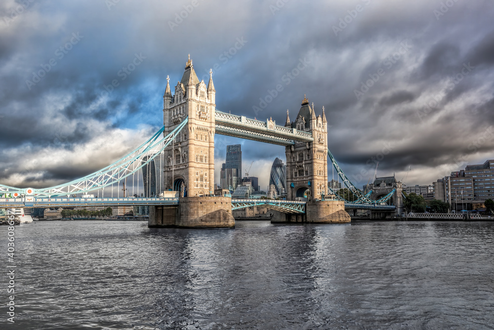 Obraz premium Tower Bridge with dramatic cloudy sky in London, England, UK