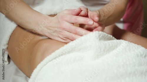 Technique for lymphatic drainage massage of the female abdomen.