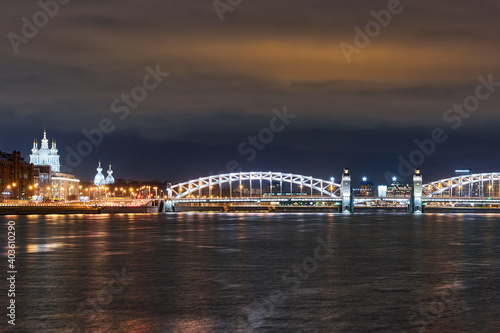 Russia, Petersburg, Night view of the Bolsheokhtinsky bridge across Neva river © vizland