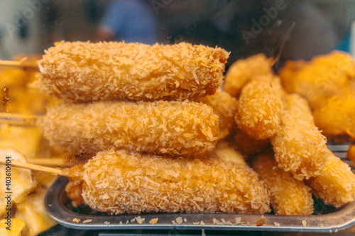 Delicious fried cheese sticks are selling on street in Vietnam