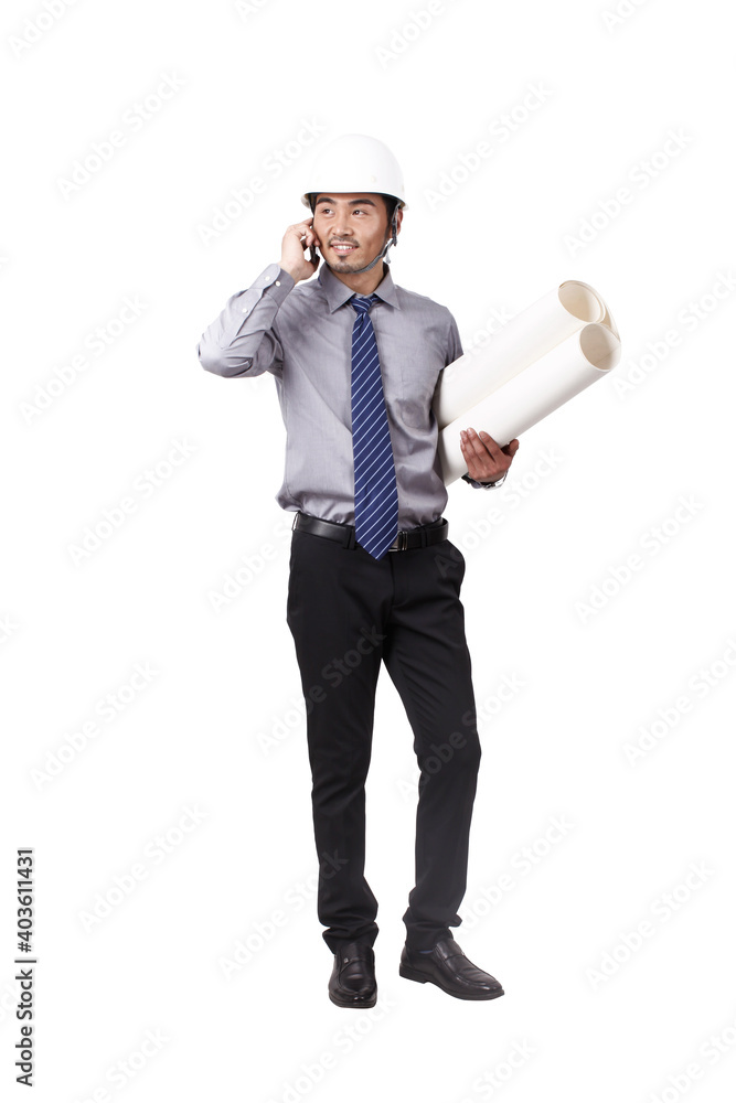 Construction management holding blueprints and using phono Construction management holding blueprints and using phono