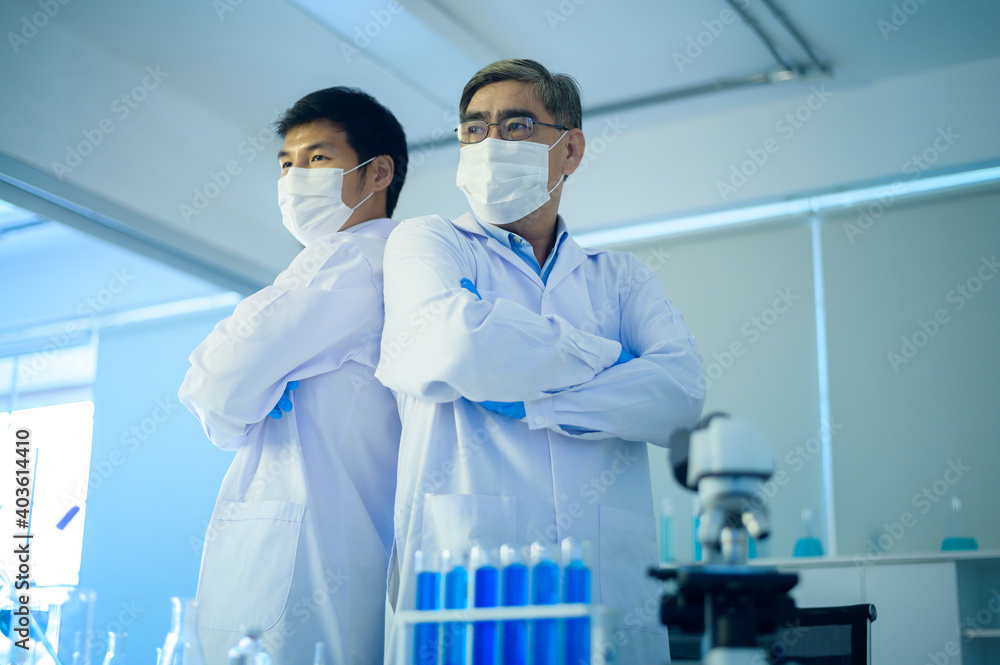 Portrait of scientist during experiment in laboratory, Science and technology healthcare concept Portrait of scientist during experiment in laboratory, Science and technology healthcare concept
