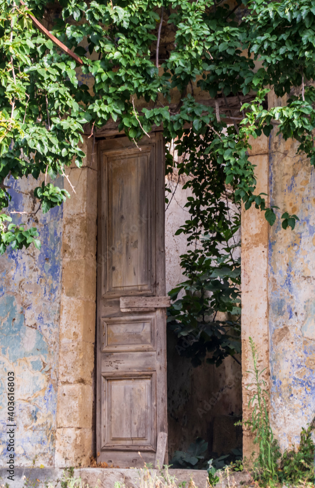 Doorway of a derelict building in the beautiful town of Asos Kefalonia Greece