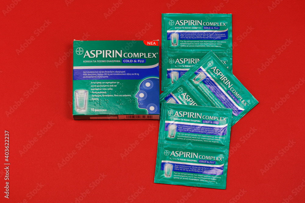 Aspirin Complex Cold & Flu display. Top view of Bayer medicine package used  diluted on water to relieve from pain with fever and runny nose symptoms.  Photos | Adobe Stock