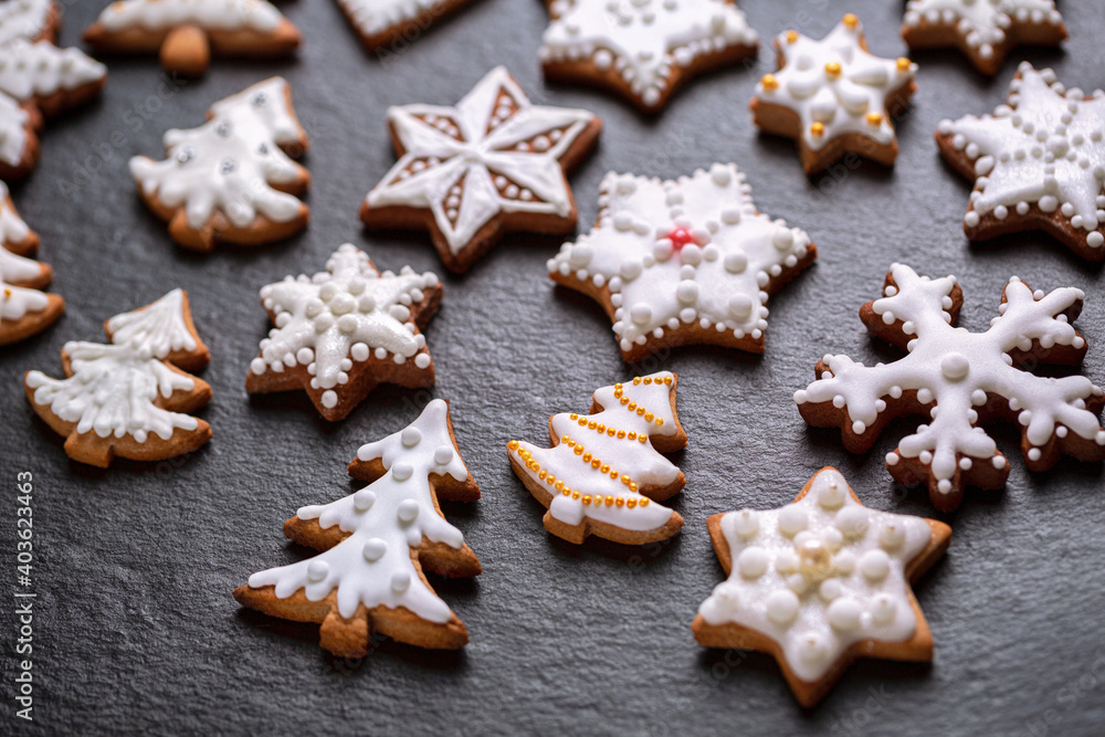 Homemade christmas cookies on slate table Homemade christmas cookies on slate table