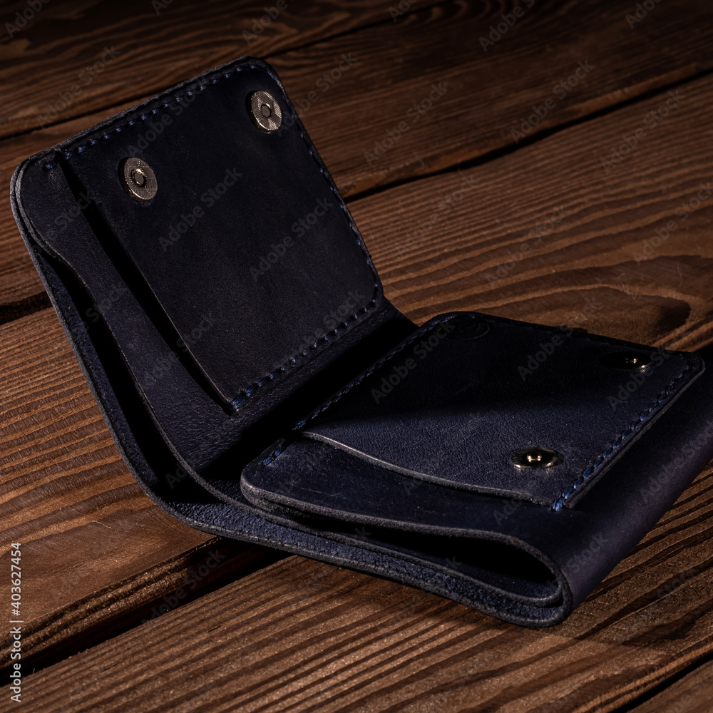 leather products on the wooden background leather products on the wooden background