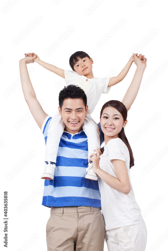Fototapeta premium Portrait of a young family of three 
