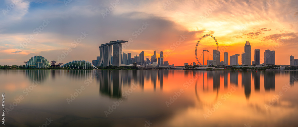 Landscape of financial district and business building at sunset time in Singapore city