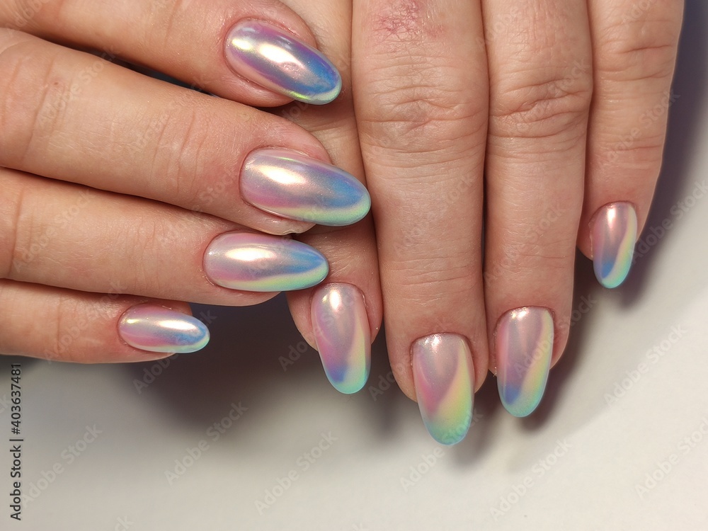 beautiful manicure of nails on the background of a fashionable beautiful manicure of nails on the background of a fashionable