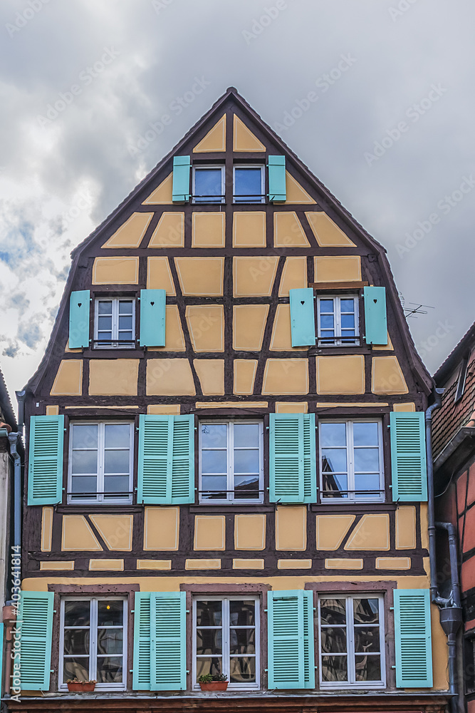 Street scene with colorful traditional French houses in Colmar old town. Colmar is a charming town in Alsace. Colmar, France. Street scene with colorful traditional French houses in Colmar old town. Colmar is a charming town in Alsace. Colmar, France.