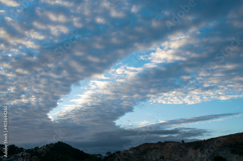 Mountain silhouette in overpopulated area of Guatemala at sunset, zone 18 area with the largest urban population in Central America.